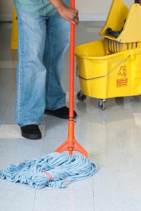 Cavallero Cleaning Service LLC janitor mopping floor